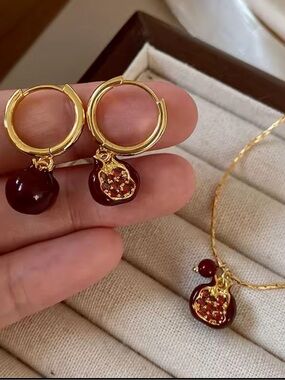 Anthropologie Gold Hoop Earrings with Deep Red Pomegranate Charms
